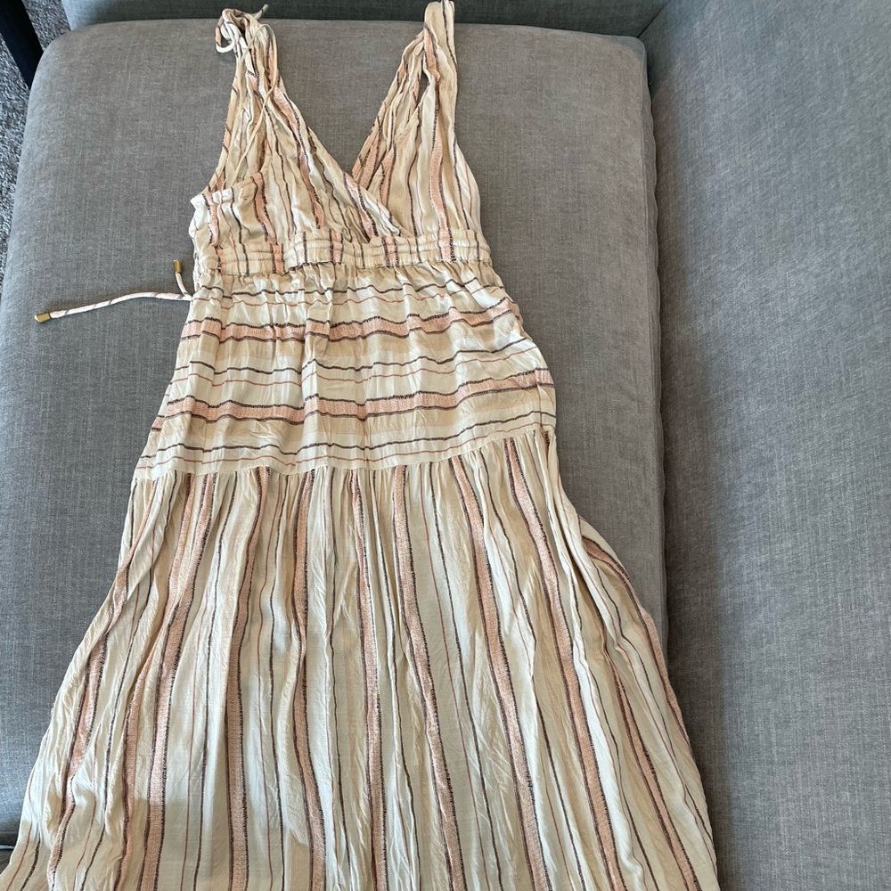 Great cut out low cut dress for beach